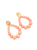Boucles d'oreilles goutte en perles résine pêche brillant - Doré